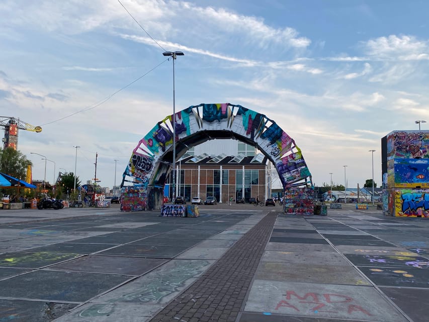 Amsterdam: Urban Bike Tour, Graffiti Art & Magnet Fishing - Crossing the IJ to Amsterdam Noord