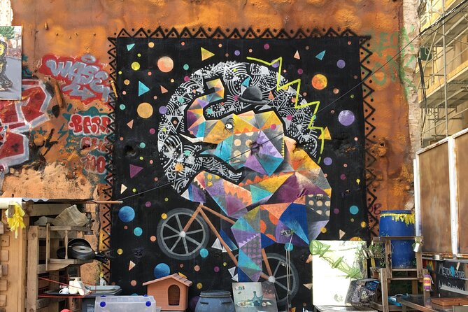 Barcelona Street Art Tour with Exclusive Artist Studios Visit - Poble Sec murals along Paral·lel