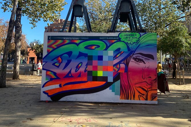 Barcelona Street Art Tour with Exclusive Artist Studios Visit - Tres Xemeneies, skateboards, and living street art
