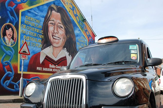 Belfast Famous Black Taxi Tour Political Murals & Peace Wall 2 Hr - Divis and the International Wall: starting with the city’s scars