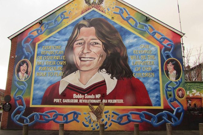 Belfast: Murals Taxi Tour - The Peace Wall and the meaning of a locked gate
