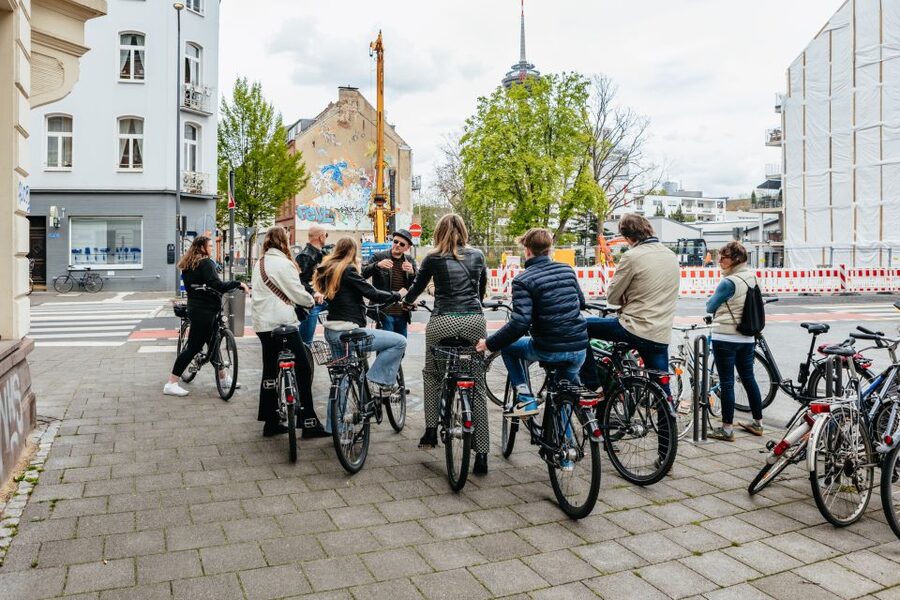 Cologne: Ehrenfeld Street Art Bike Tour - Ehrenfeld: studios, murals, and a café pause