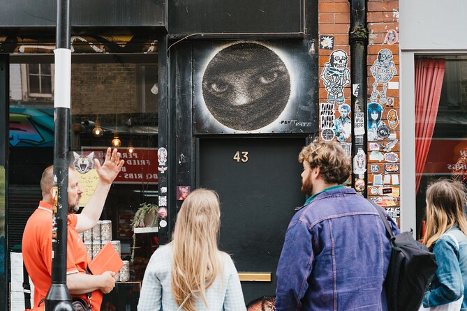 East End London Instagrammable Street Art and Graffiti Tour - Banksy, glass panels, and the question of ownership