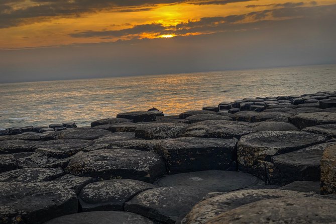 Giants Causeway Tour from Belfast + FREE Belfast Mural Tour - Dunluce Castle and the coast’s best photo stops