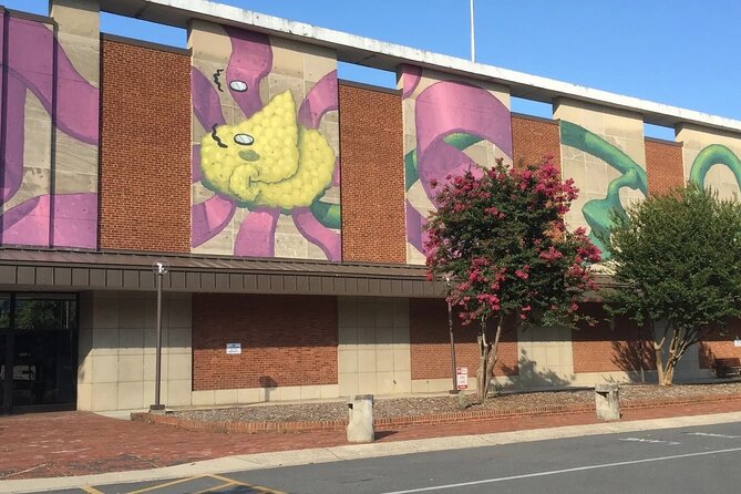 "In The Streets & Eats" Mural Art Tour Of Charlotte - Uptown Charlotte, with murals tucked between the big sights