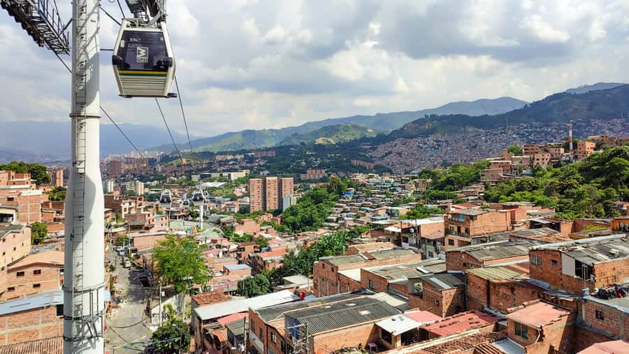 Medellin: Comuna 13 Graffiti Tour, Cable Car & Street Food - Reading the murals instead of just photographing them