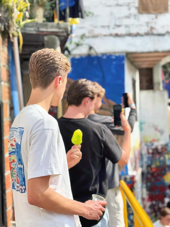 Medellín Comuna 13 local guides snacks and your own graffiti - The opening walk through 20 de Julio