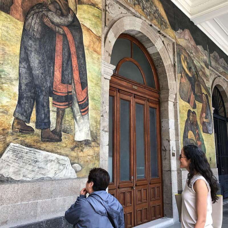 Mexico City: History on Walls. Mexican Murals Walking Tour - A former colonial palace and the grief of war