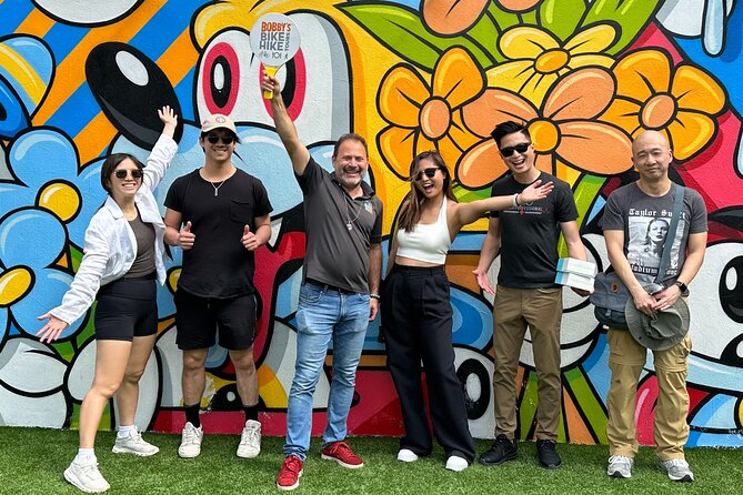 Miami Wynwood Walls Street Art & Neighborhood Walking Tour - Reading the murals at Wynwood Walls