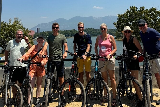 Tirana Mural Bike Tour: Street Art, Culture & Photography Stops - Lokomotiva, the painted tank, and industrial art