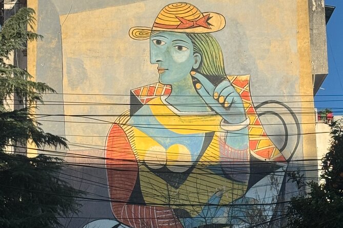 Tirana Mural Bike Tour: Street Art, Culture & Photography Stops - FAB Gallery and an upside-down bunker