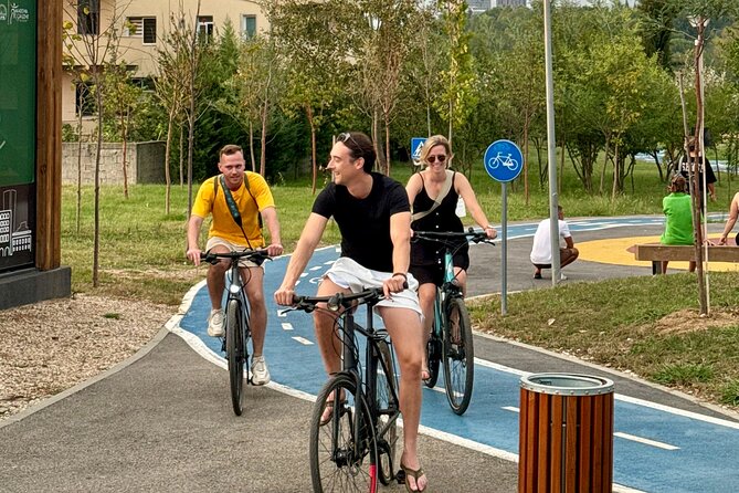 Tirana Mural Bike Tour: Street Art, Culture & Photography Stops - Rocket01, Sizmikazot, and murals with a sense of humor