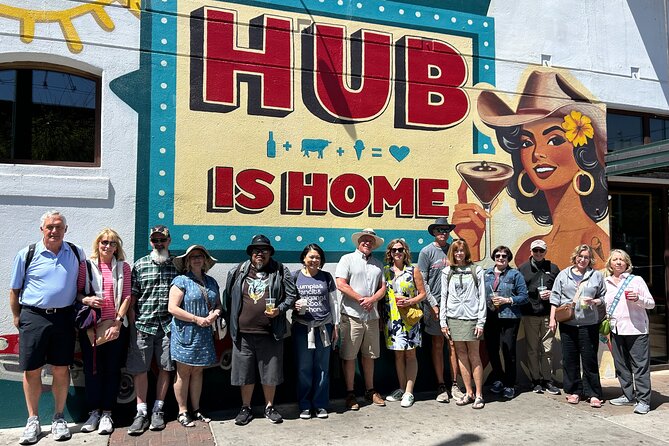 Tucson Food Tours- Locally Owned Mural and History Tour - Pima County Courthouse in pink and mosaic