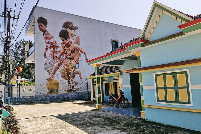 Visiting Tam Thanh mural village - Mother Thu monument - Stop one: the Mother Thu Monument